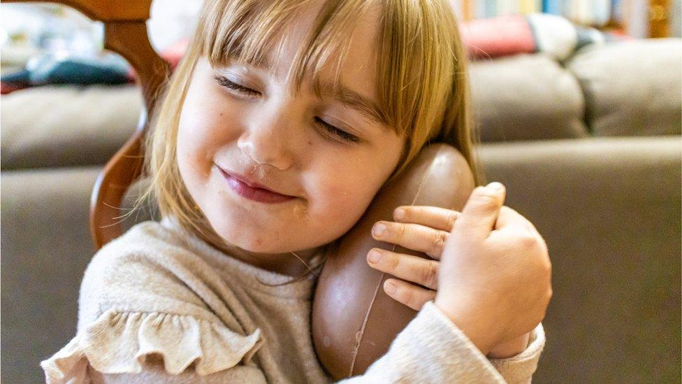 girl-holding-easter-egg.