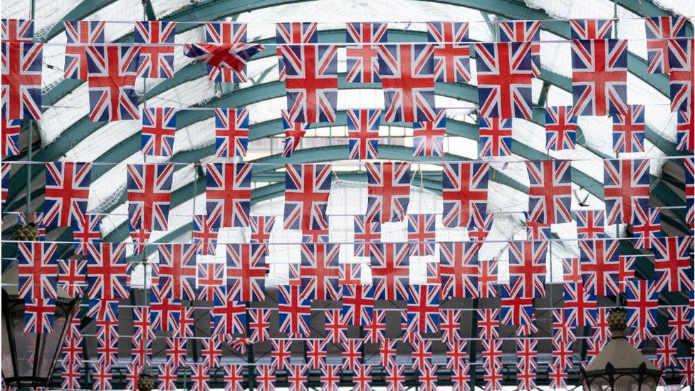 Union flags hanging in Covent Garden Market, London