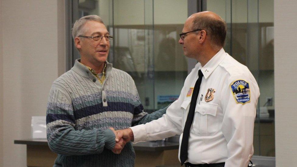 Earl Melchert (left) who helped rescue 15-year-old kidnapping victim Jasmine Block, with Police Chief Richard Wyffels of Alexandria, Minnesota