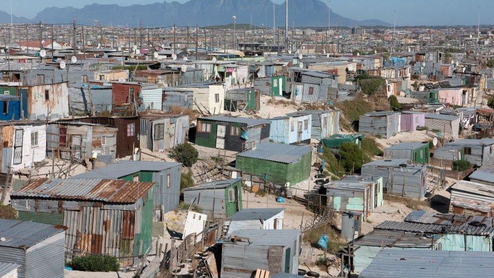 cape town neighbourhood with broken buildings