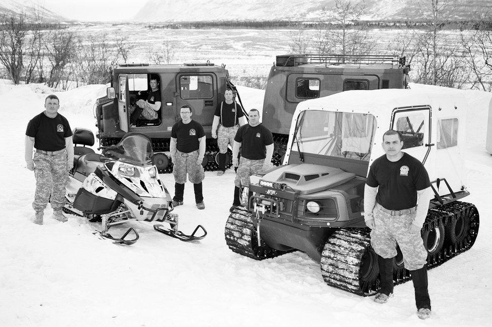 Staff Sergeant Rinson Neth (right) and his team