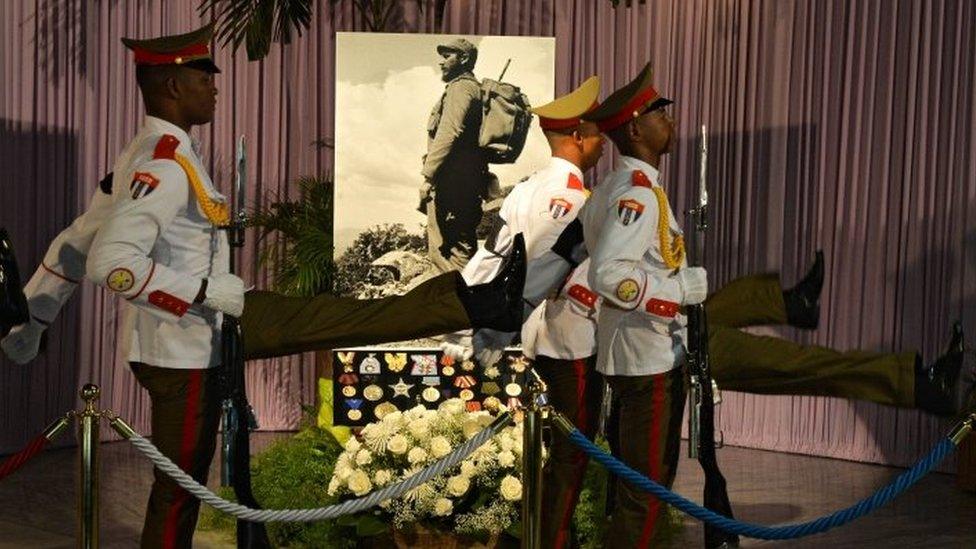 Soldiers guard while people pay their last respects to Cuban revolutionary icon Fidel Castro kicking off a series of memorials in Havana, on November 28, 2016