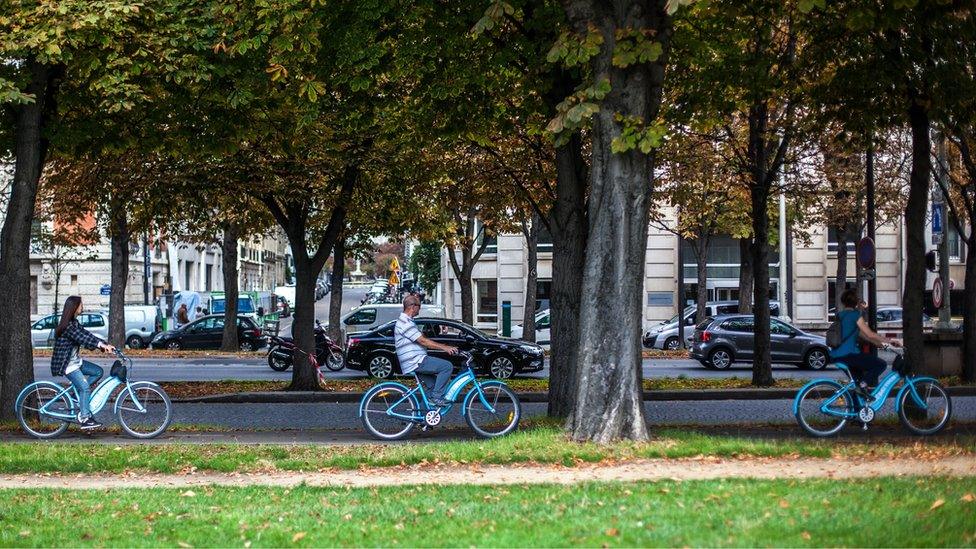 Image shows three cyclists