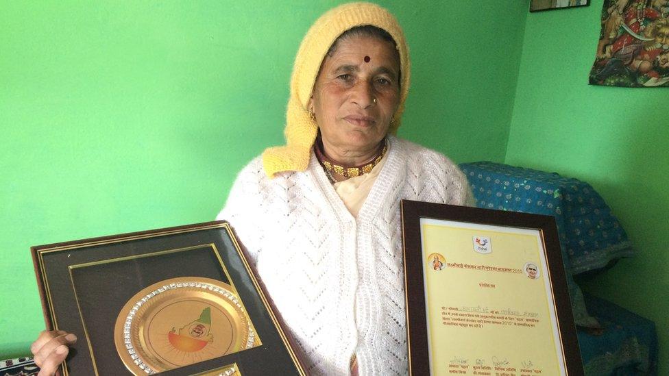 Kalawati Devi Rawat with some of her awards