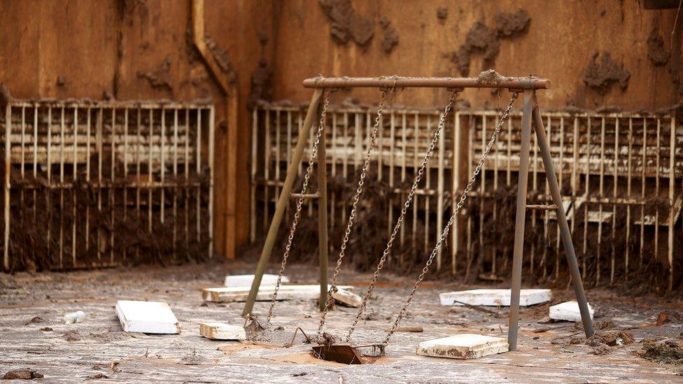 Swings in a school in the village of Bento Rodrigues, which was completely deluged by 2015 mudslides in Brazil