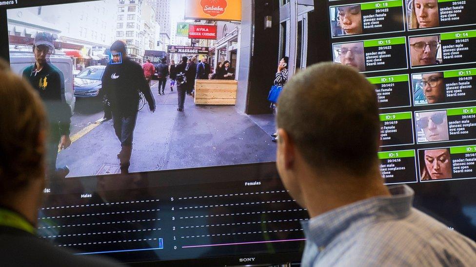 A display shows a facial recognition system for law enforcement during the NVIDIA GPU Technology Conference