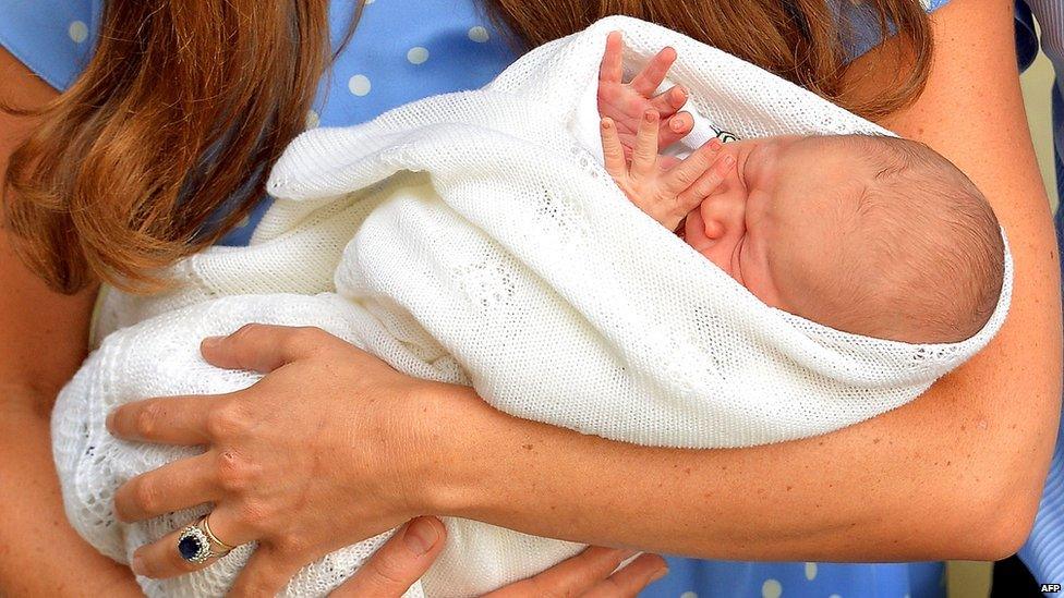 Newborn prince, snuggled up in his mother's arms while he stretches out his fingers, this was then called his first official wave .