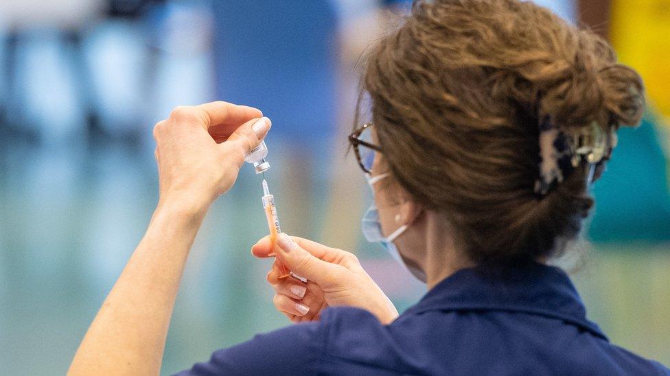 Nurse with vaccine