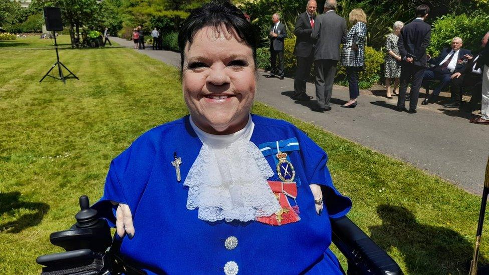 head and shoulder shot of Rosaleen in formal attire with medals