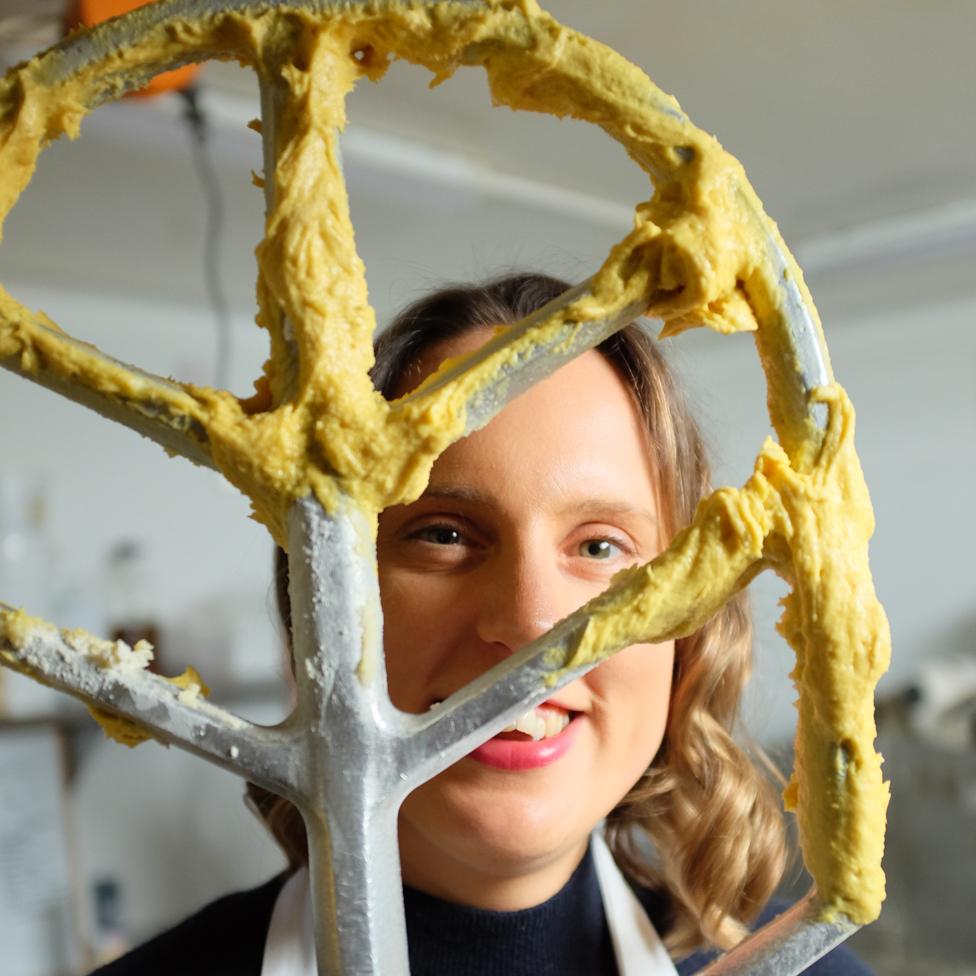 Frances Quinn with a giant whisk