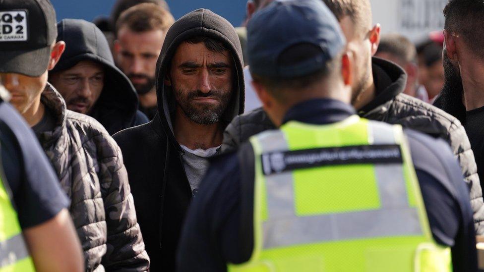 Migrants being brought ashore at Dungeness