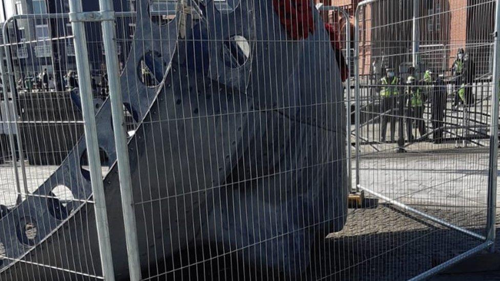 Security fencing surrounding the memorial