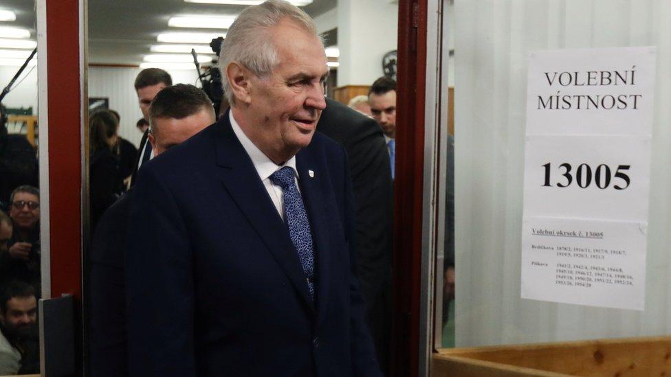 Czech President Milos Zeman arrives to cast a vote during the presidential election at a polling station in Prague, January 12, 2018