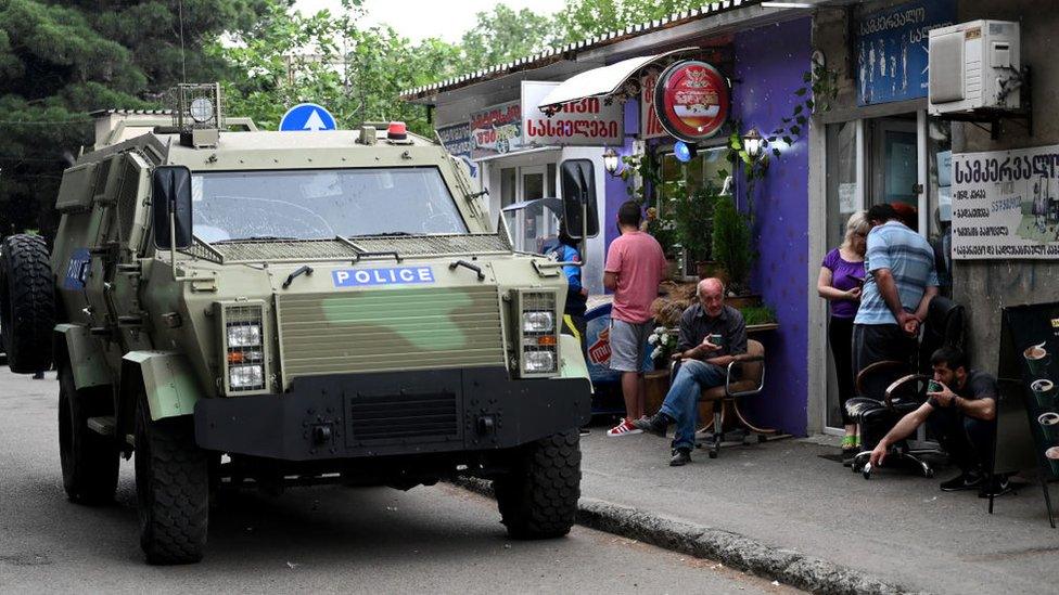 A Georgian police car patrols the streets of Tbilisi, June 2020