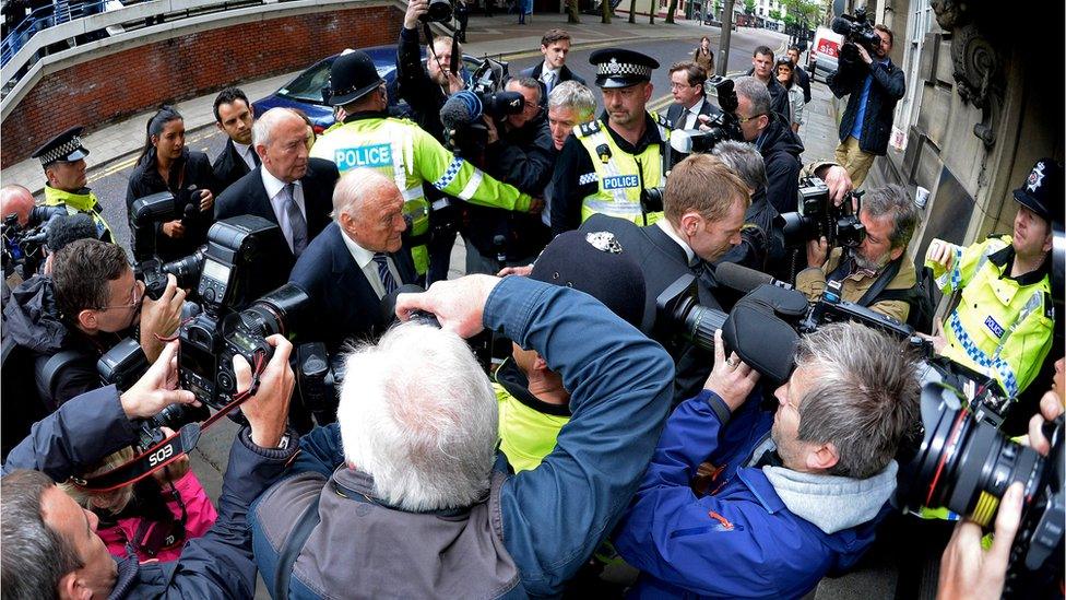 Broadcaster Stuart Hall arrives at Preston Crown Court for sentencing on June 17, 2013 in Preston