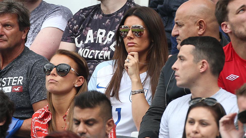 Rebekah Vardy sitting behind Coleen Rooney during a Euro 2016 match