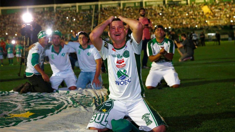 Fans of Chapecoense pay tribute to their players at the Arena Conda stadium in Chapeco, Brazil November 30, 2016