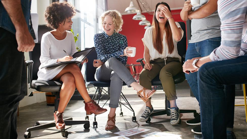 Female workers laughing