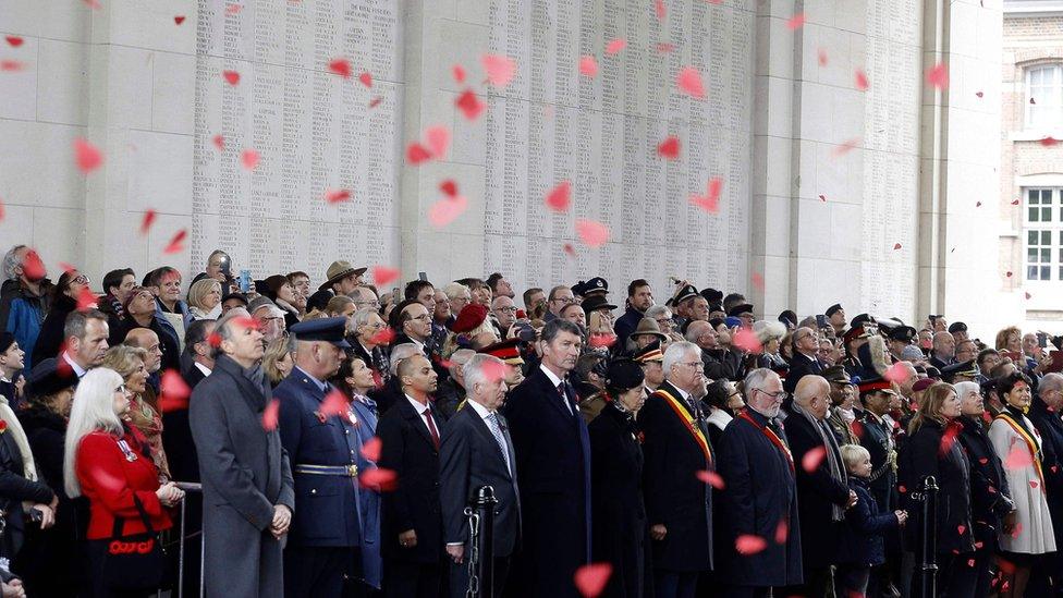 Britain's Princess Anne (C) pays a tribute during the Last Post ceremony at the Commonwealth War Graves Commission of the Ypres Memorial at the Menenpoort (Menin Gate) in Ieper - Ypres, on November 11, 2017