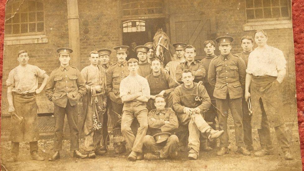 William is standing third from the left with the bridals in his arms