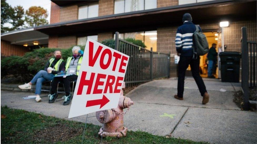 Voters arrive to cast their ballots at the W I Patterson Community Center in Durham, North Carolina, USA, 03 November 2020