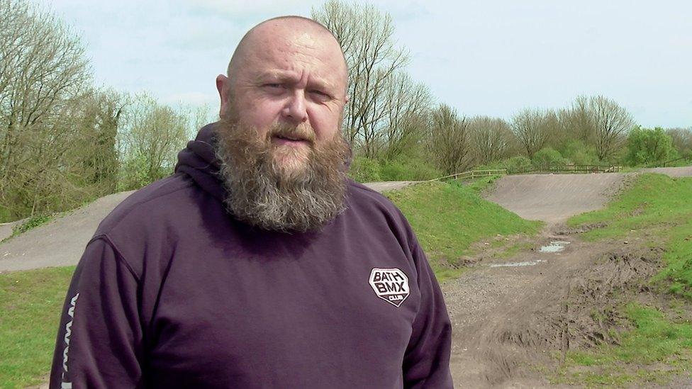 Duncan Cockburn standing on the BMX track