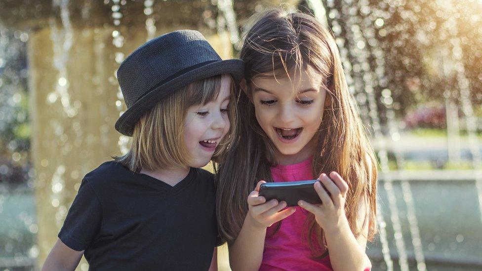 Children on a phone