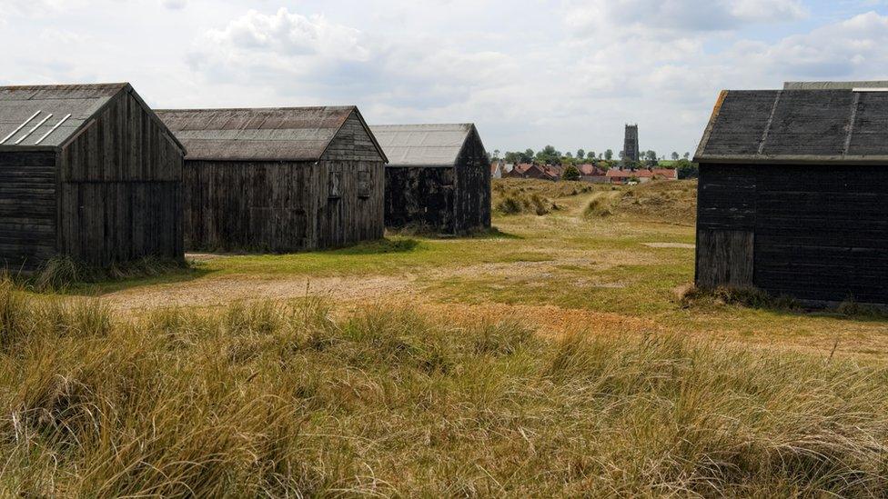 Sheds, houses and church at Winterton