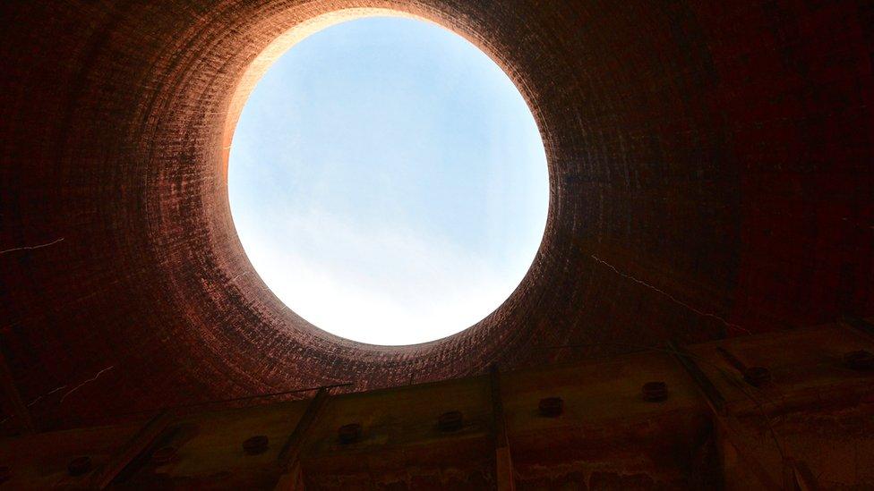 The opening at the top of a cooling tower