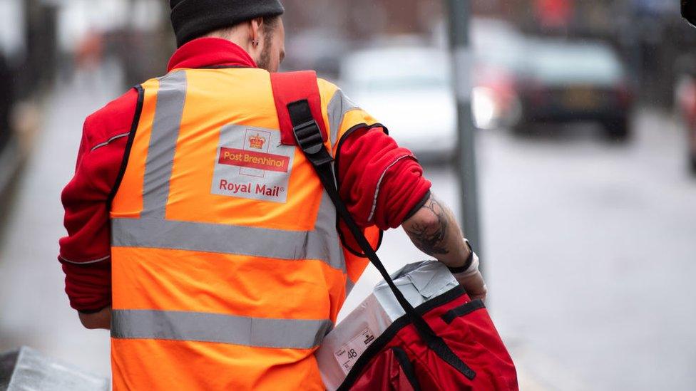 Postman with parcels