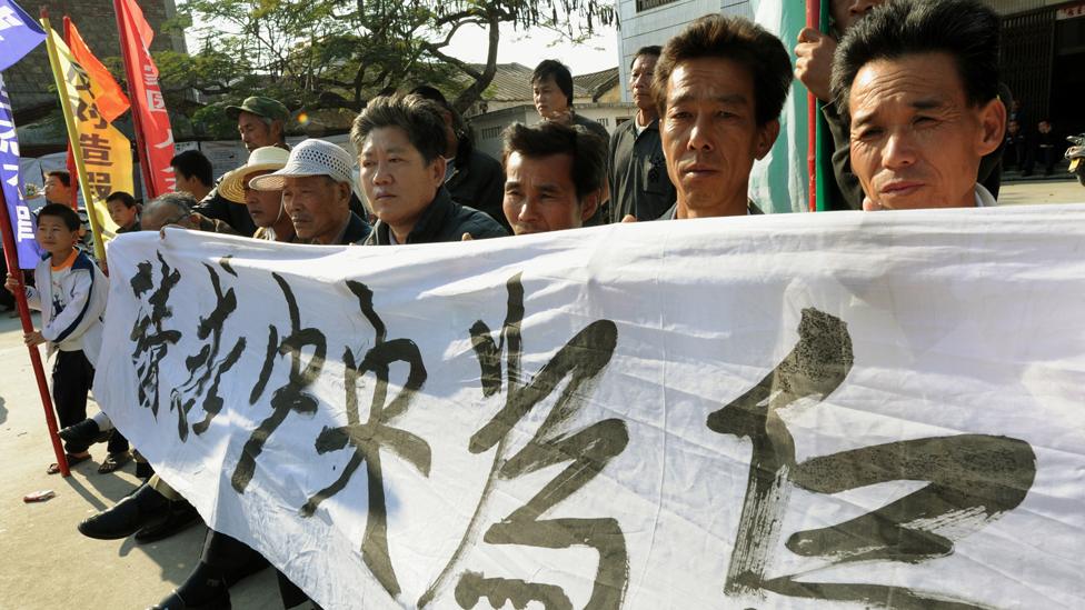 Villagers protest in the southern province of Guangdong, after the death in custody of a local leader on 19 December, 2011