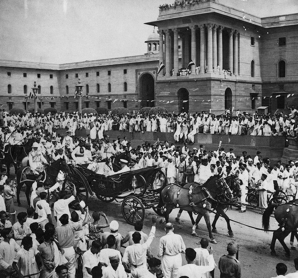 Lord Mountbatten in a ceremonial buggy ride in Delhi on 15 August 1947 amid crowds