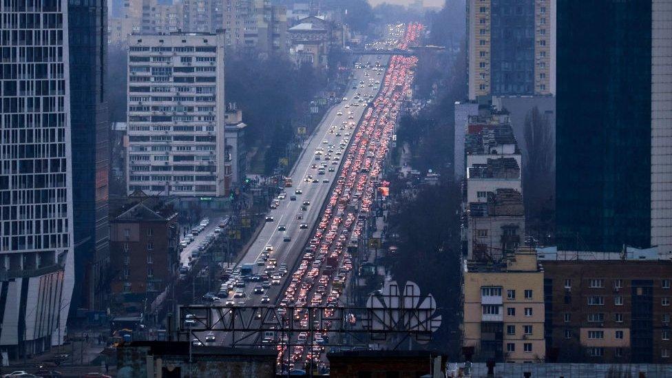 Residents of Kyiv leave the city following pre-offensive missile strikes of the Russian armed forces on February 24