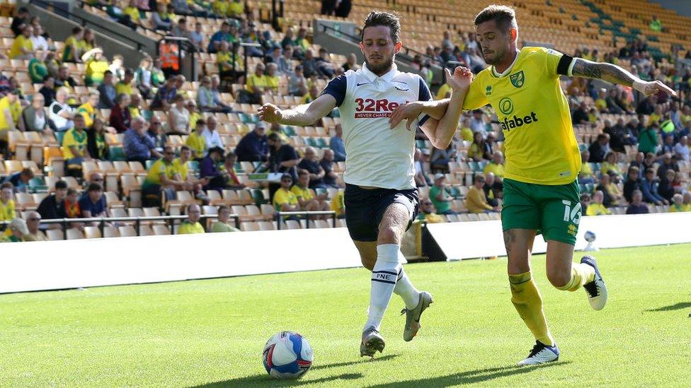 Alan Browne of Preston North End battles for possession with Todd Cantwell of Norwich City