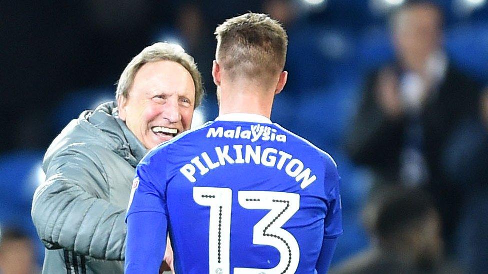 Neil Warnock greets Anthony Pilkington after his winner against Wolves