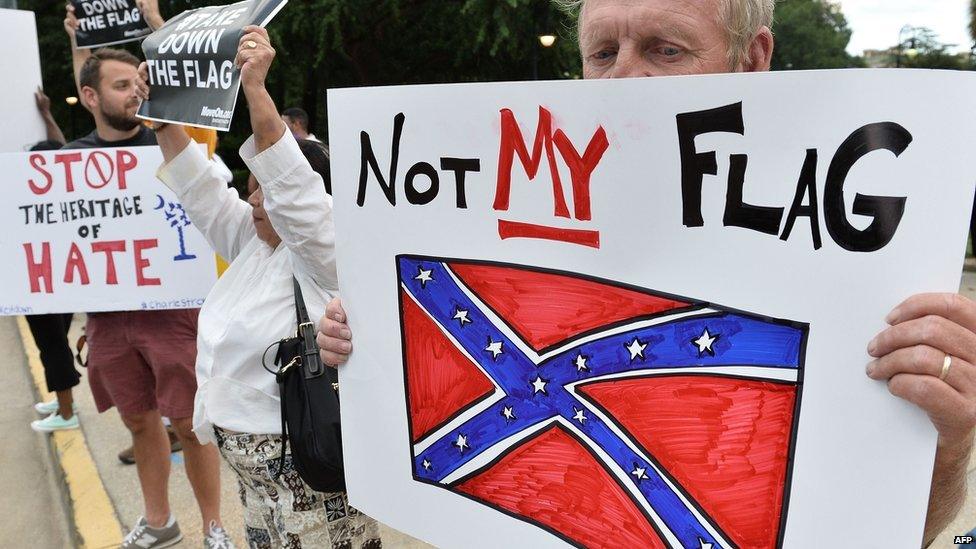 Protesters rallied to have the flag taken down on Tuesday