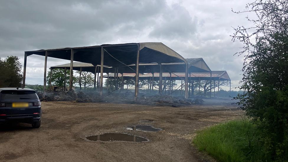 The shells that remain of the barns at Pettaugh after Saturday's fire