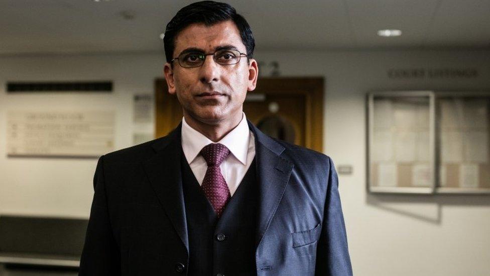 Ace Bhatti playing the part of Nazir Afzal in Three Girls