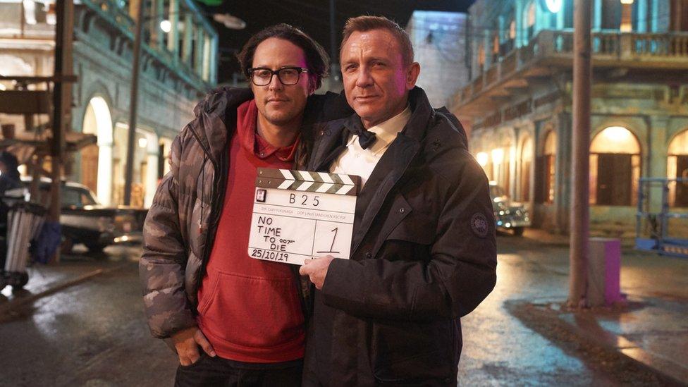 Cary Joji Fukunaga and Daniel Craig on the No Time To Die set