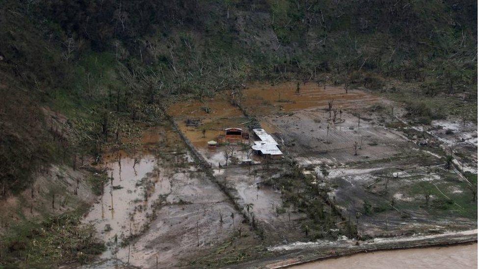 A destroyed house and farmland is seen after Hurricane Matthew passes Jeremie, Haiti, 5 October 2016.