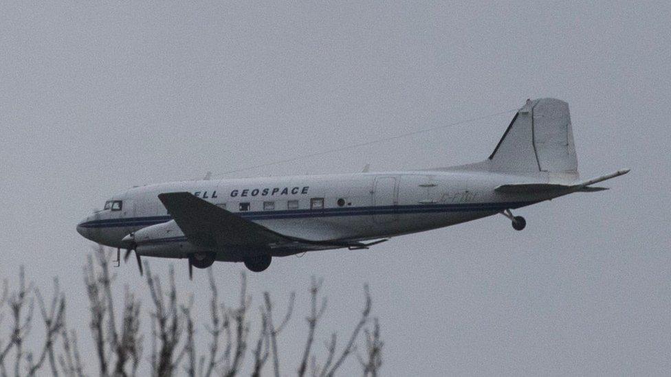 Plane flying over Cornwall