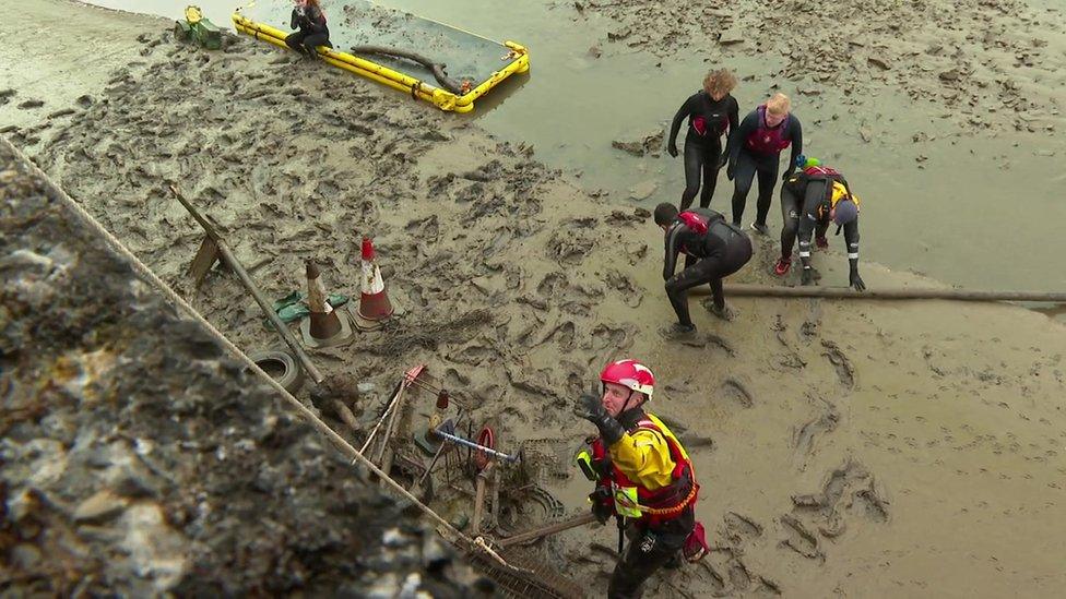 People in wetsuits in the River Taw