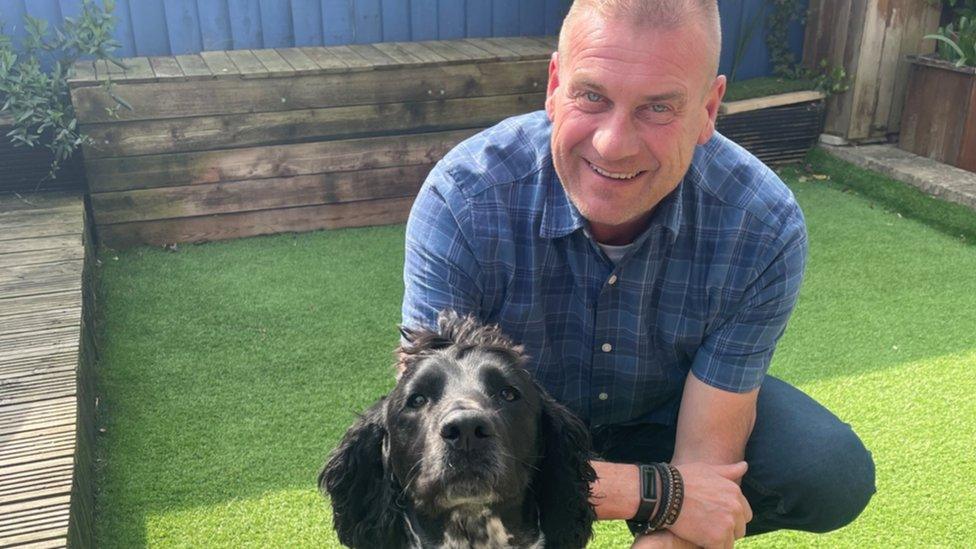 Phil Hawkins with Otis the dog