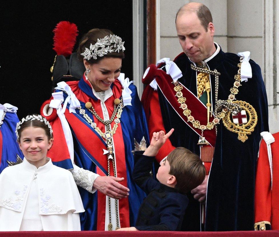 Prince Louis on the Buckingham Palace balcony with Princess Charlotte and the Prince and Princess of Wales