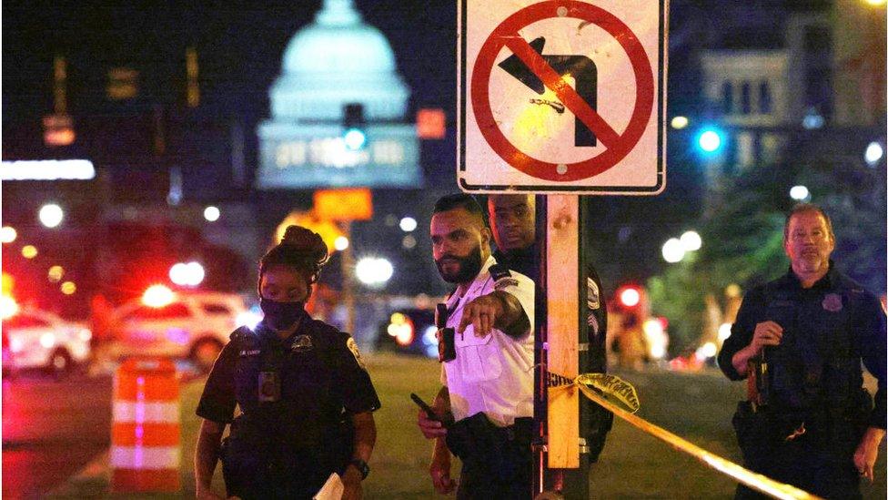 Investigators in DC examine a crime scene