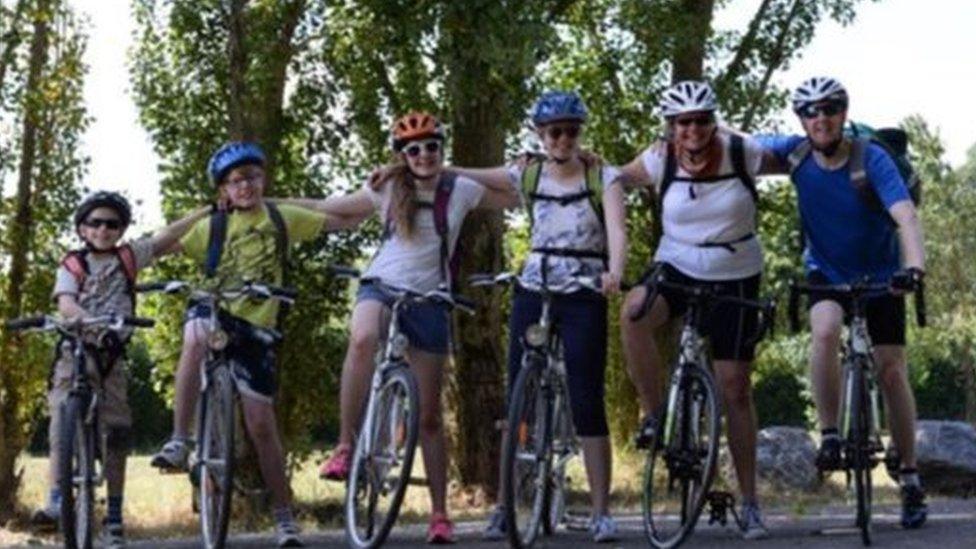 The Simpson family on their bikes