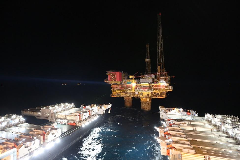 Ship approaches Brent Delta at night