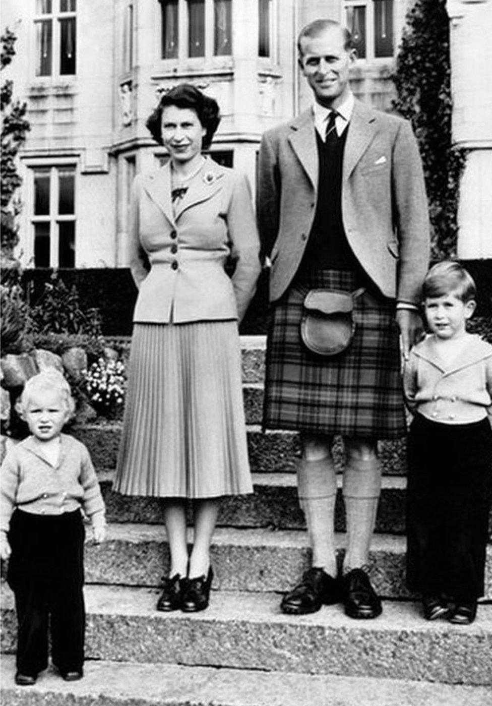 The Queen, Prince Philip with a young Prince Charles and Princess Anne