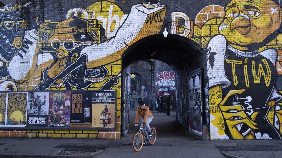 Railway arches covered in graffit