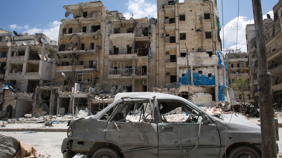 File photo from 28 April 2016 showing damaged Al-Quds hospital building following reported air strikes in rebel-held Aleppo, Syria